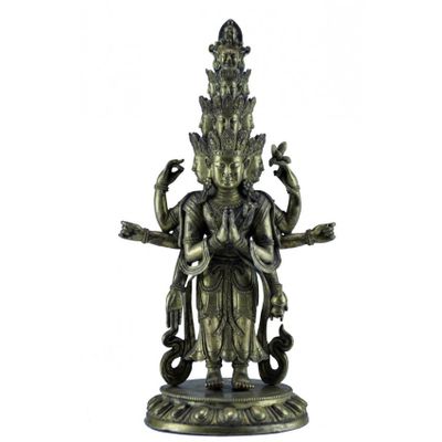 A GILT-BRONZE FIGURE OF AN ELEVEN-HEADED AVALOKITESVARA 