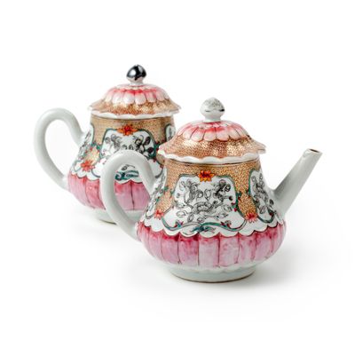 A pair of Chinese famille rose lotus-shaped teapots and covers