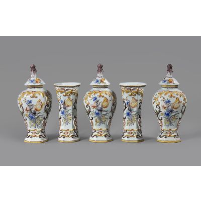 A Dutch Delft polychrome five-piece vase garniture decorated with Dutch tulips