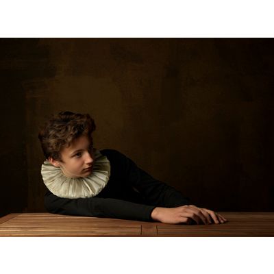 Boy with white Collar at Table