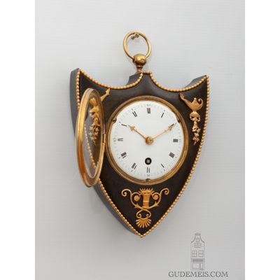 A rare and small French Empire bronze cartel wall clock, circa 1810.