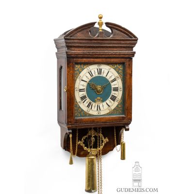 A rare Dutch Frisian stained oak hood clock, circa 1780.
