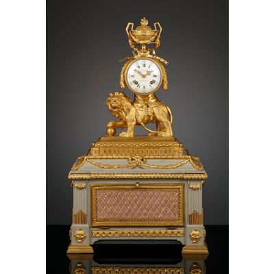 French Louis XVI lion mantel clock with musical box