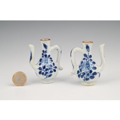 A pair of rare Chinese porcelain miniature jugs.