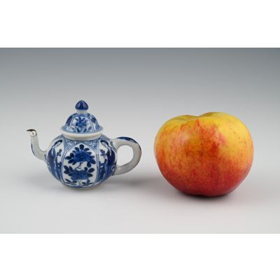 A miniature Chinese porcelain teapot.
