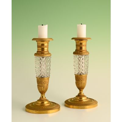 A pair of  ormolu bronze Empire candle sticks