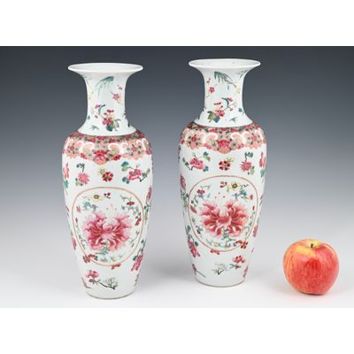 A pair of Chinese porcelain Famille Rose baluster Vases.