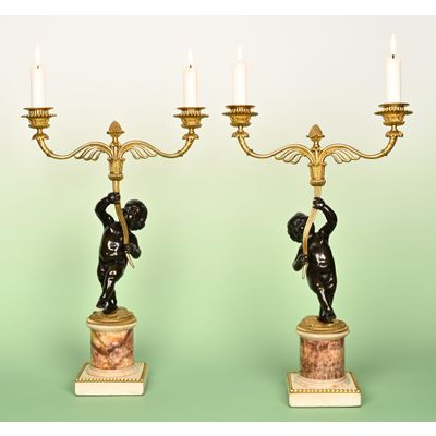 A Pair of English Candalabras with Bleu John.