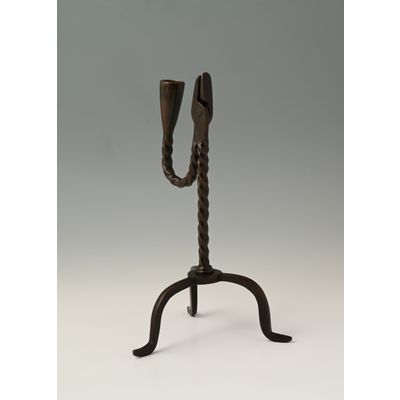 A rare bronze candle holder