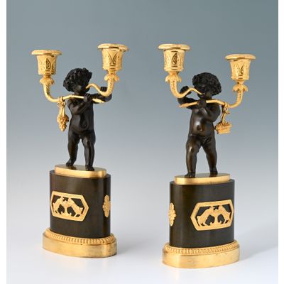 A pair of Empire candelabras
