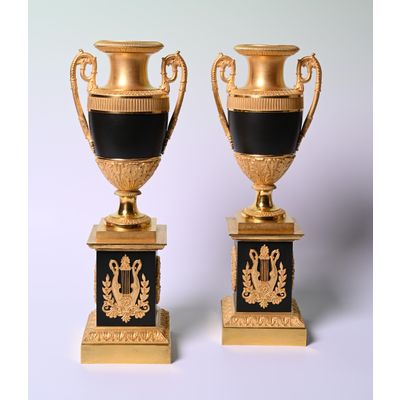 A pair of ormolu and patineted bronze Empire vases