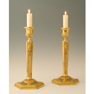 A pair of  ormolu bronze Empire candle sticks