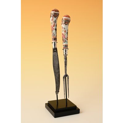 Een mes en vork met Chinees porseleinen greep