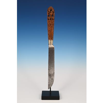 An extremely finely carved palm wood knife