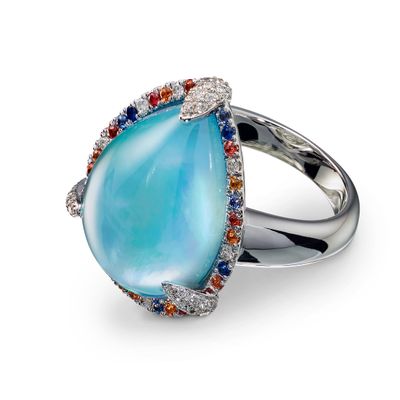 Ring with blue topaz diamonds and sapphire