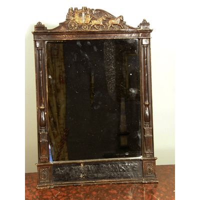 Een spiegel in houten lijst, mogelijk voormalig vertrek- en aankomsttijden lijst, ca 1880.