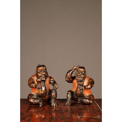 A set of two probably Japanese carved boxwood 'satyr' figures, circa 1880.
