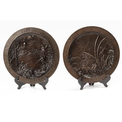 A lovely pair of far East bronze circular wall decoration circa 1880