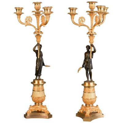 A good pair of four light empire candle sticks, circa 1820
