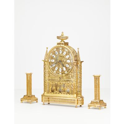 An unusual French Louis XVI filigree skeleton clock set, circa 1780
