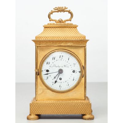 A small Vienna bronze gilt travelling clock by Tobias Flaschge, circa 1810