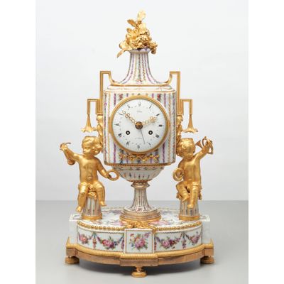 Rare French porcelain and gilt bronze mantel clock by Godon, circa 1785