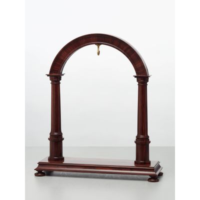 An elegant walnut contemporary custom made stand for displaying a watch