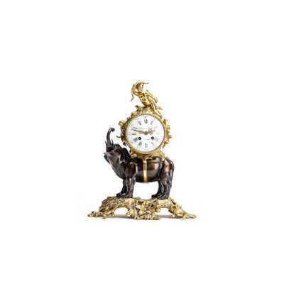 This is a very nice and highly decorative 19th-century mantel clock featuring an elephant carrying the clock on its back