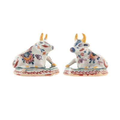 Pair of Miniature Dutch Delft Polychrome Figures of Recumbent Cows