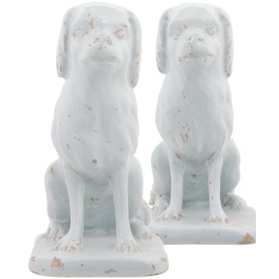Een Paar Zittende Honden in Wit Delfts Aardewerk