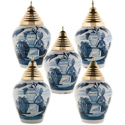 A Set of Five Blue and White Dutch Delft 'VOC' Tobacco Jars