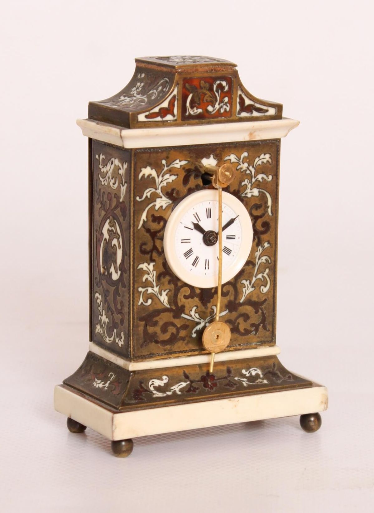 Een miniatuur Oostenrijks ivoor en Boulle zappler klokje, circa 1840 - afbeelding 1