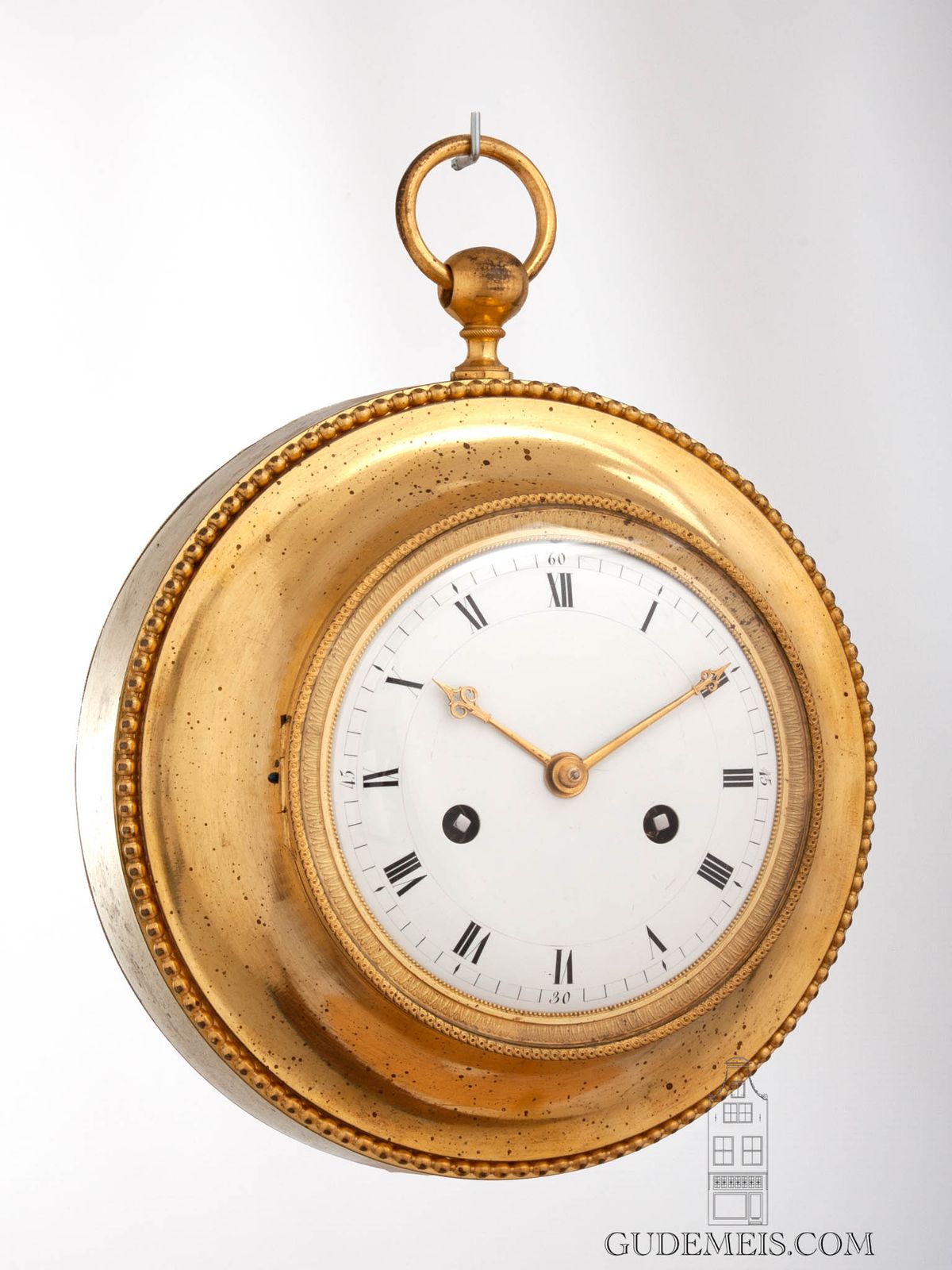 A French Empire ormolu annular striking cartel wall clock, circa 1800. - image 1