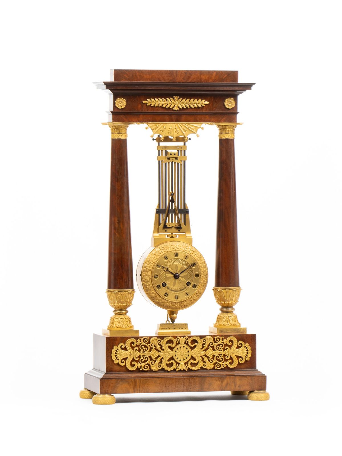 A French late Empire ormolu mounted portico mantel clock with oscillating movement, circa 1825. - image 1