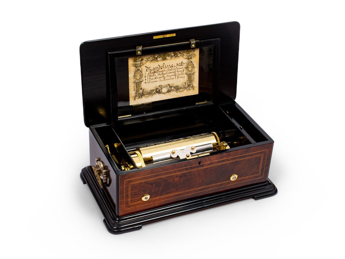 Une belle boîte à musique cylindrique incrustée de marqueterie suisse, PVF, vers 1870. - image 1