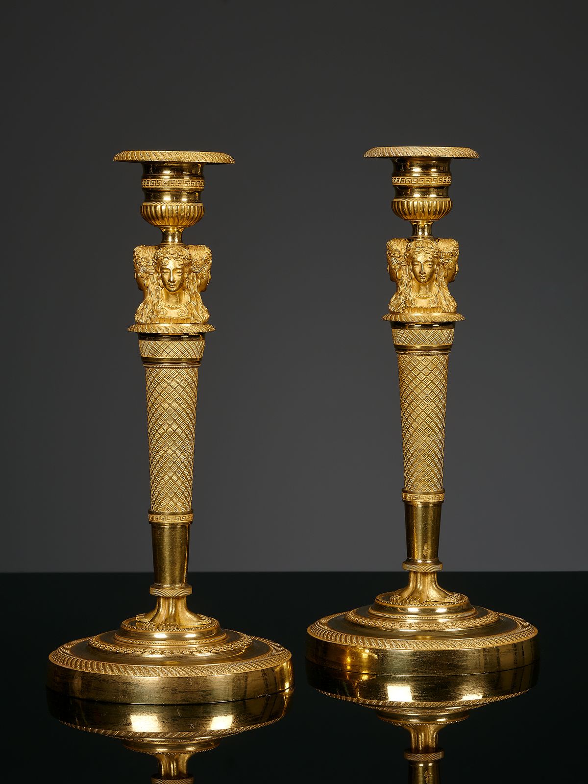 Pair of French Empire candlesticks