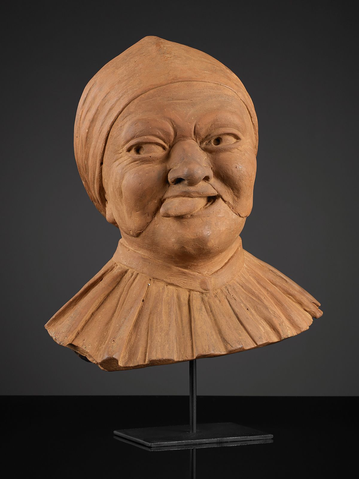 Terracotta Buste of a Woman with Shame Mask