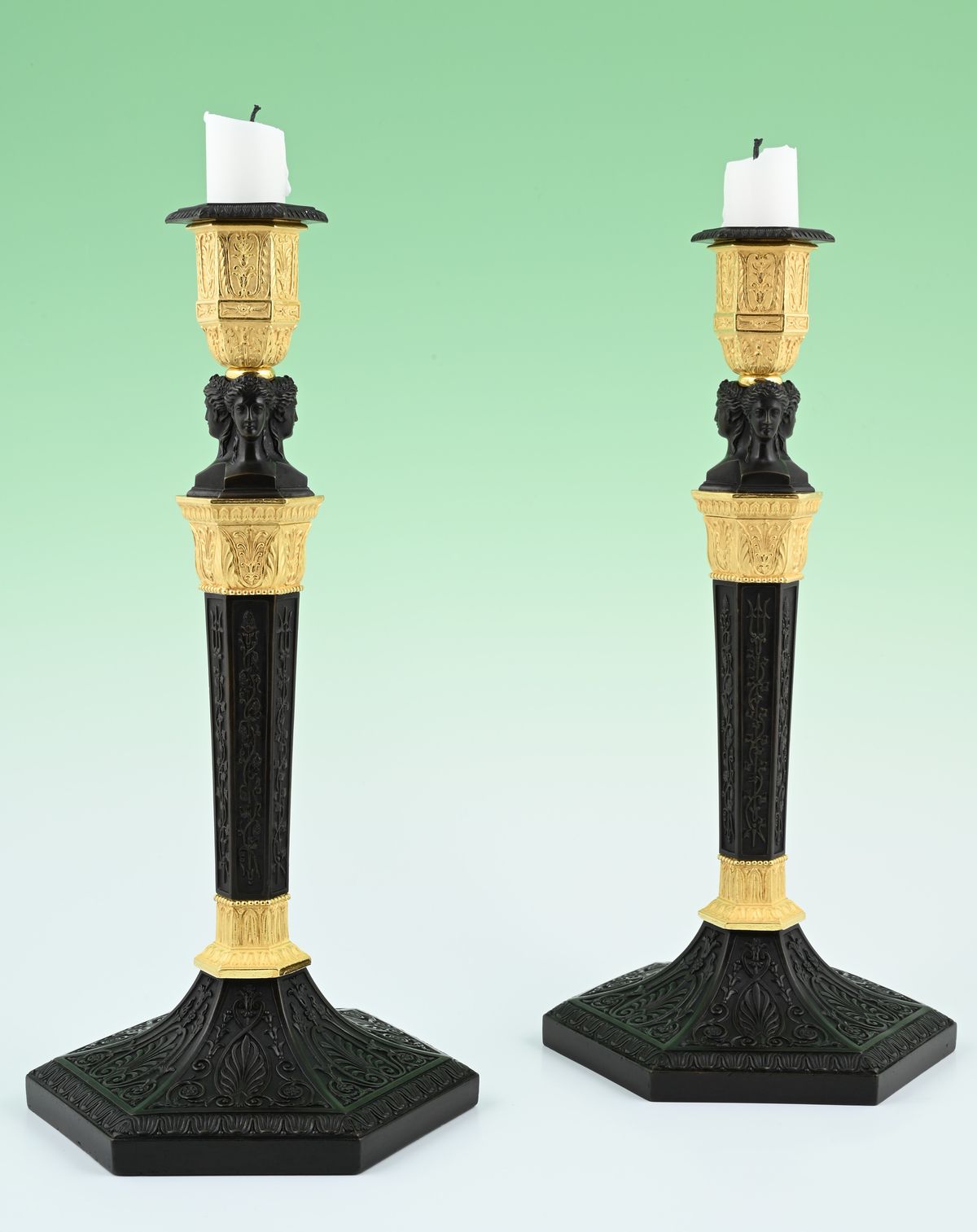A pair of  ormolu bronze and patineted Empire candle sticks - image 1
