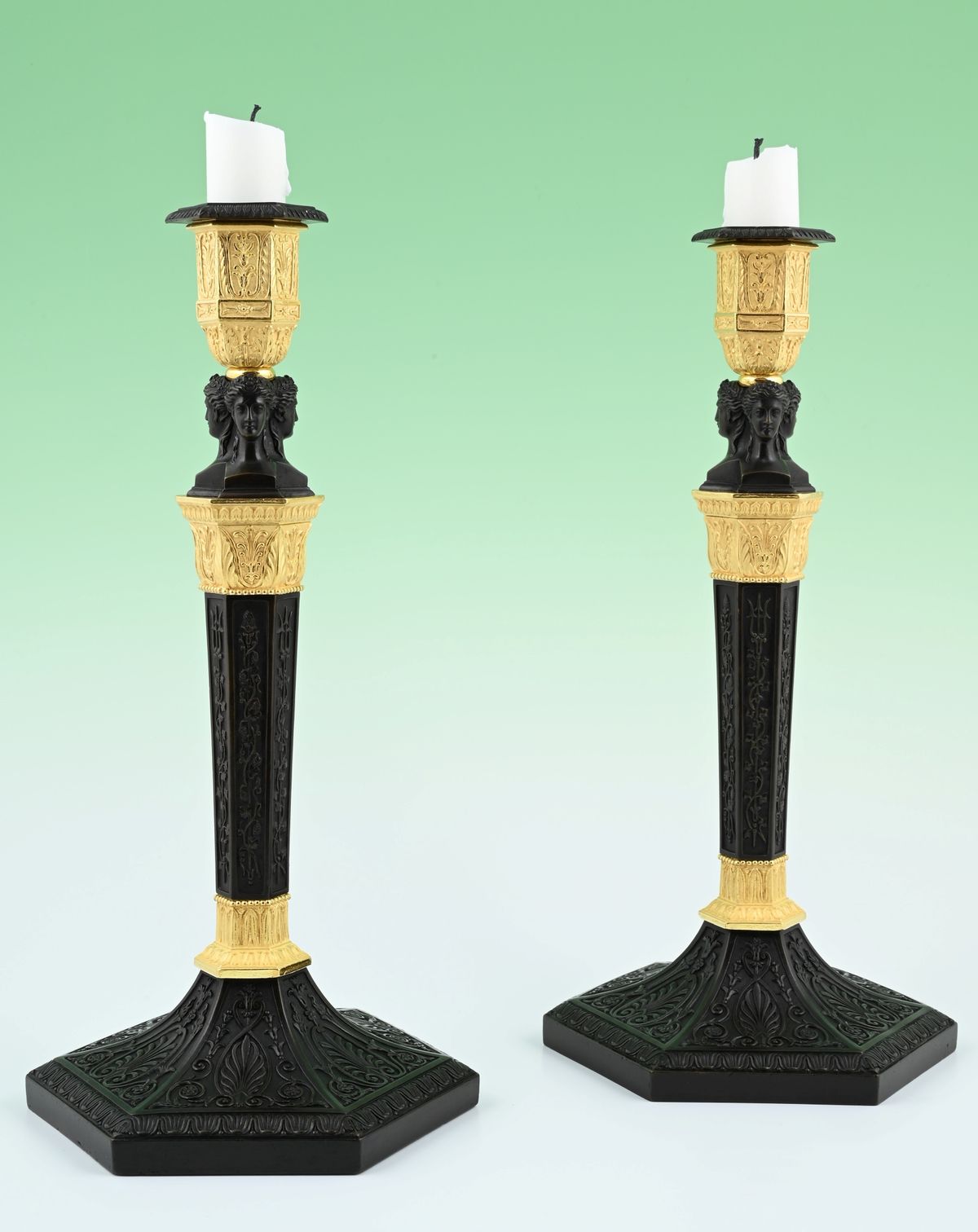 A pair of  ormolu bronze and patineted Empire candle sticks - image 1