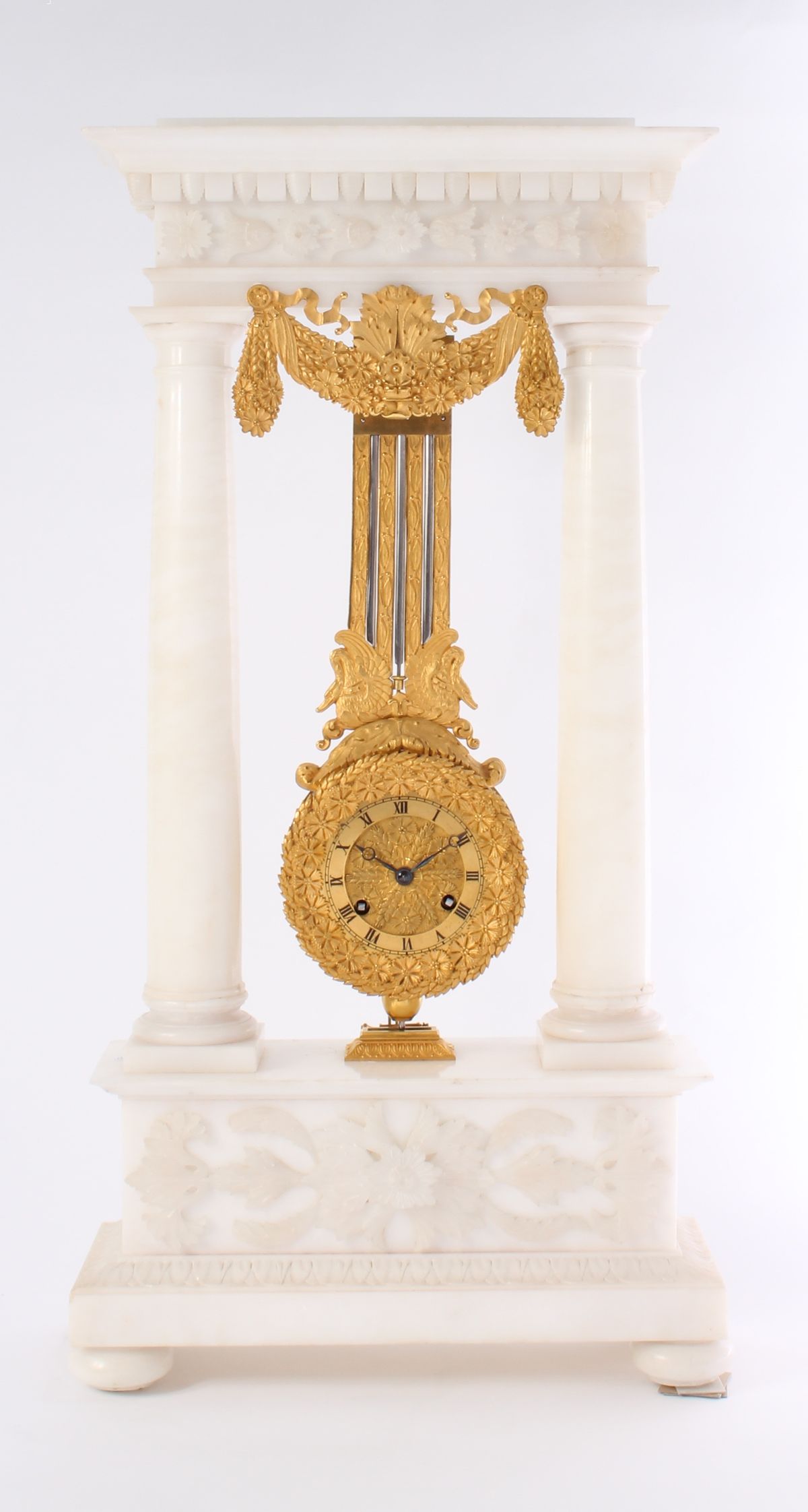 An attractive French alabaster and ormolu portico mantel clock with oscillating movement, circa 1830 - image 1
