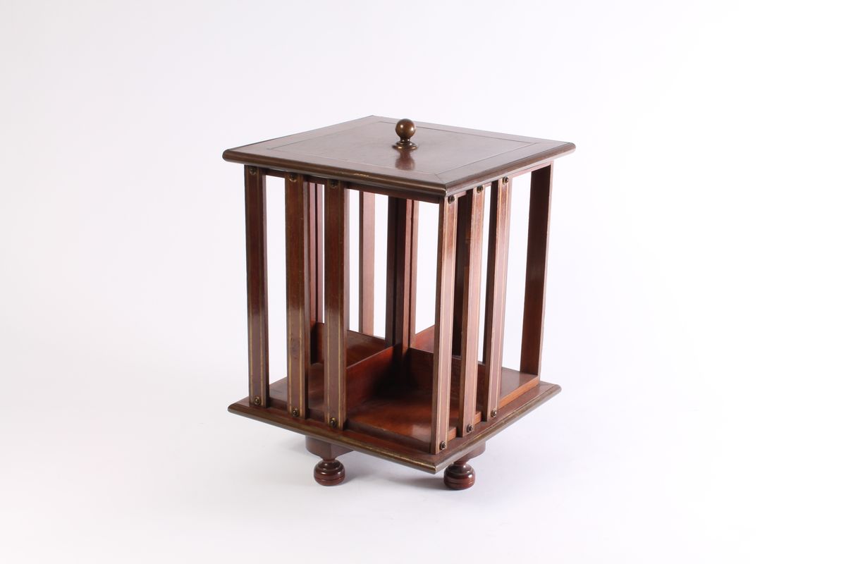 A small English brass inlaid mahogany revolving bookcase, circa 1880. - image 1