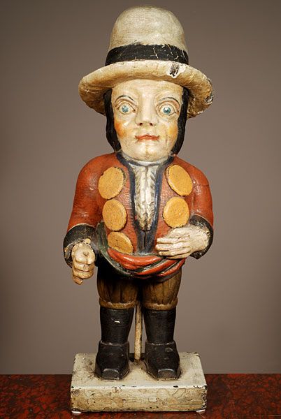 A multicoloured carved sculpture of a hunchback with remarkable buttons on his jacket, circa 1850 - image 1