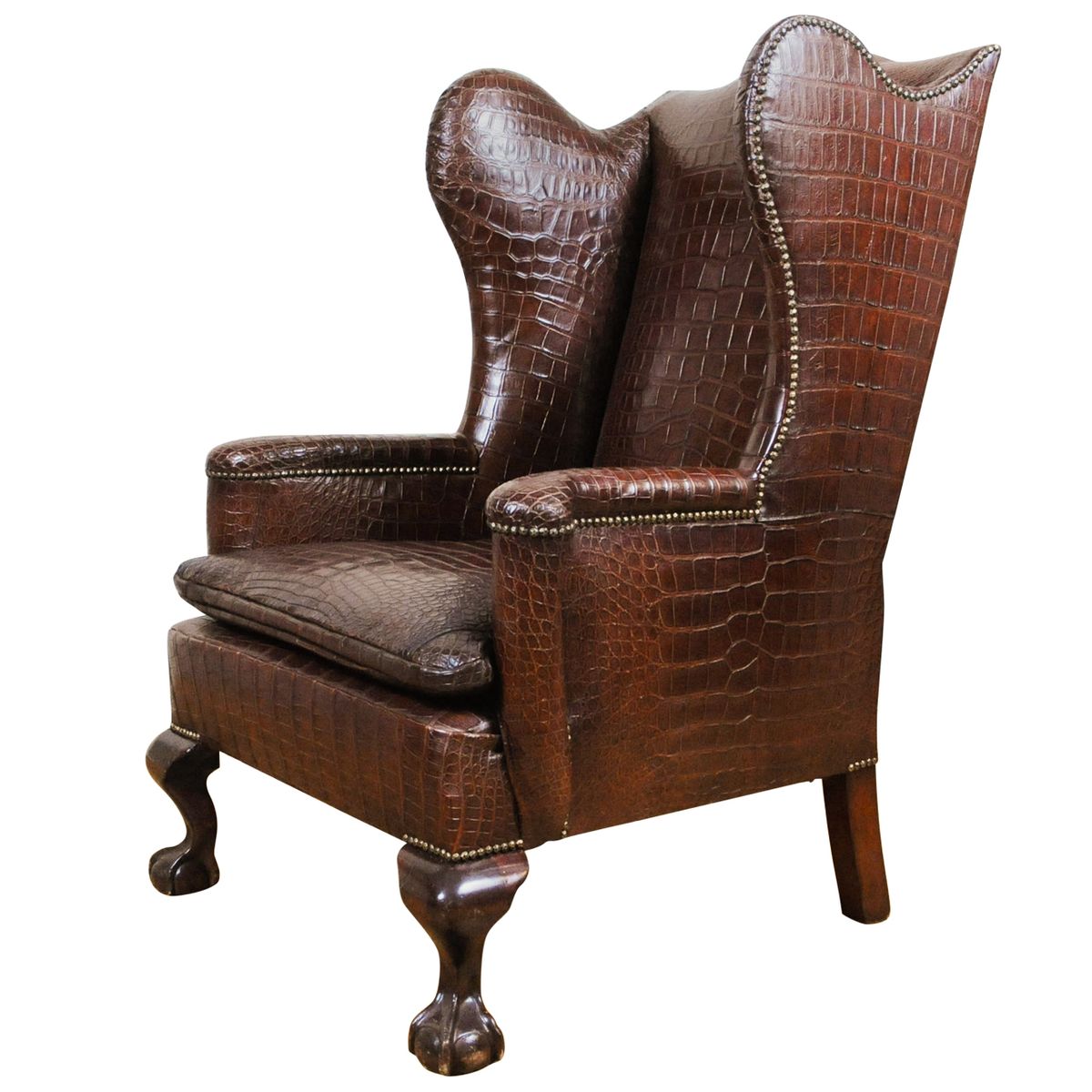 A very unusual and chic crocodile upholstered wing chair. - image 1