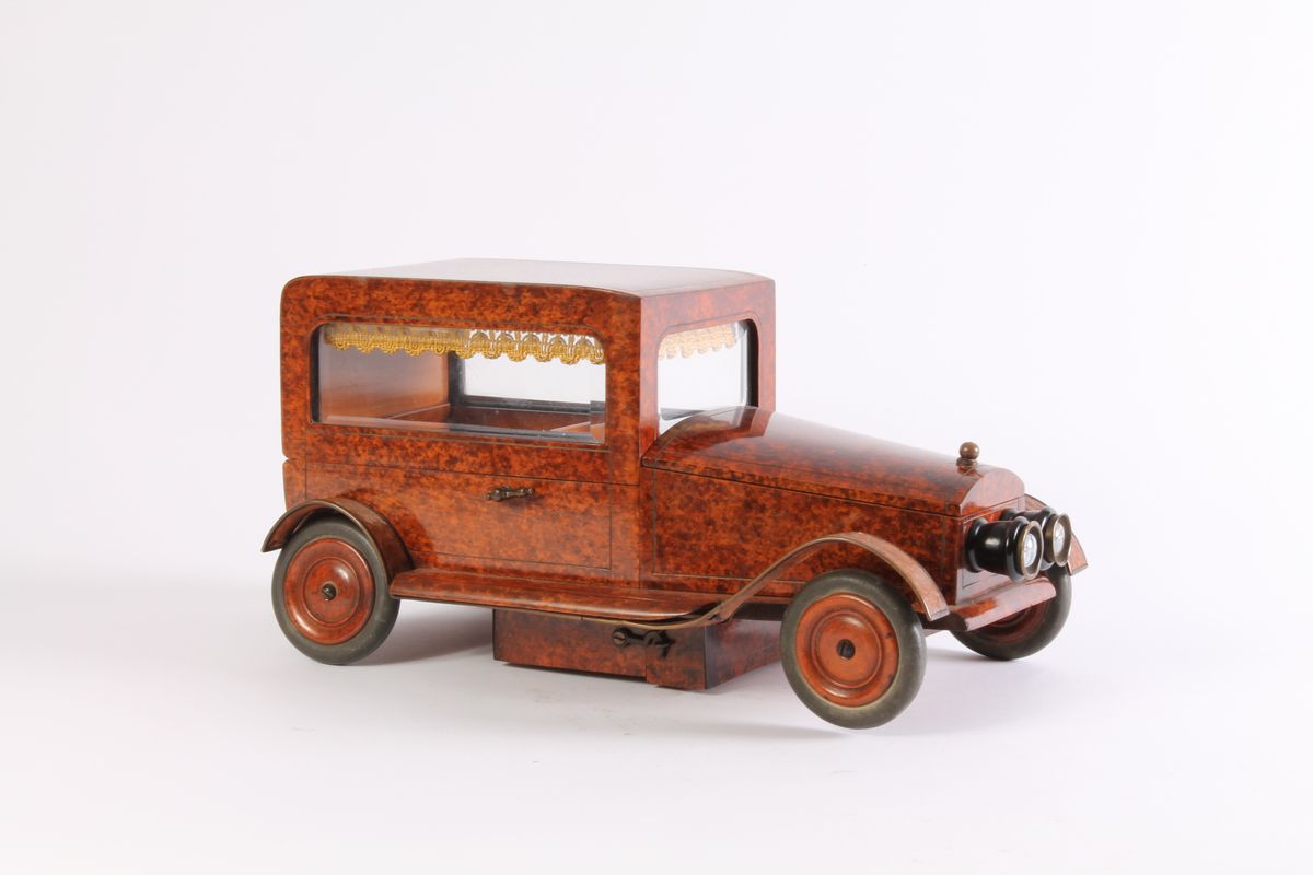 An Art Deco thuja burr model of a car with music box, circa 1930 - image 1