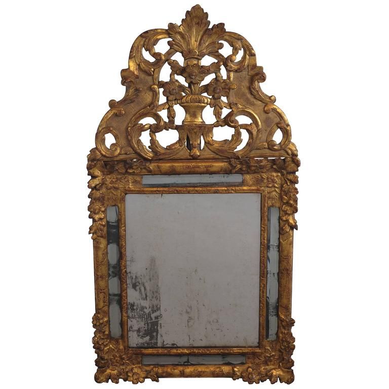 A beautiful French wood carved and original guild Regency wall mirror, 1740 - image 1