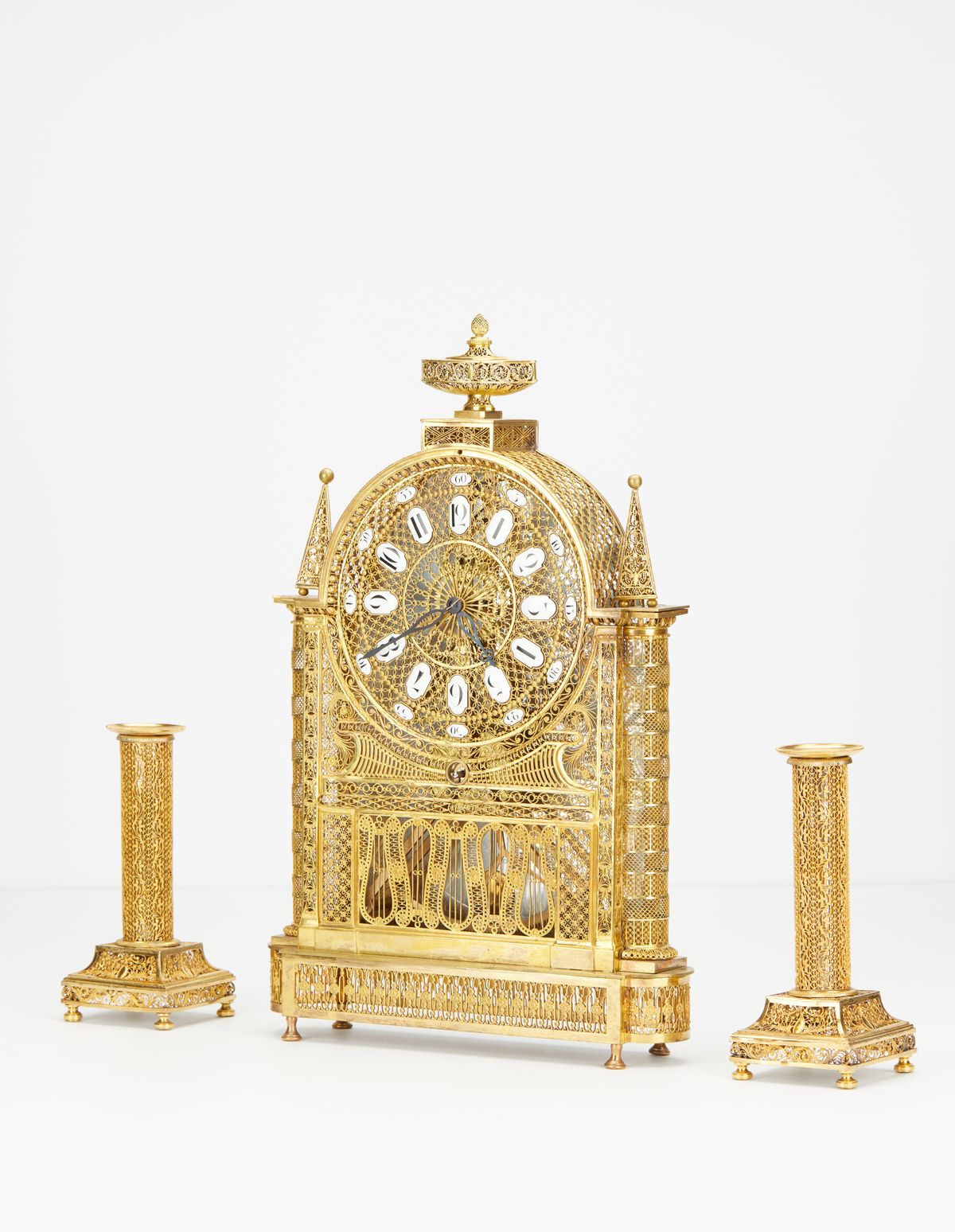 An unusual French Louis XVI filigree skeleton clock set, circa 1780 - image 1