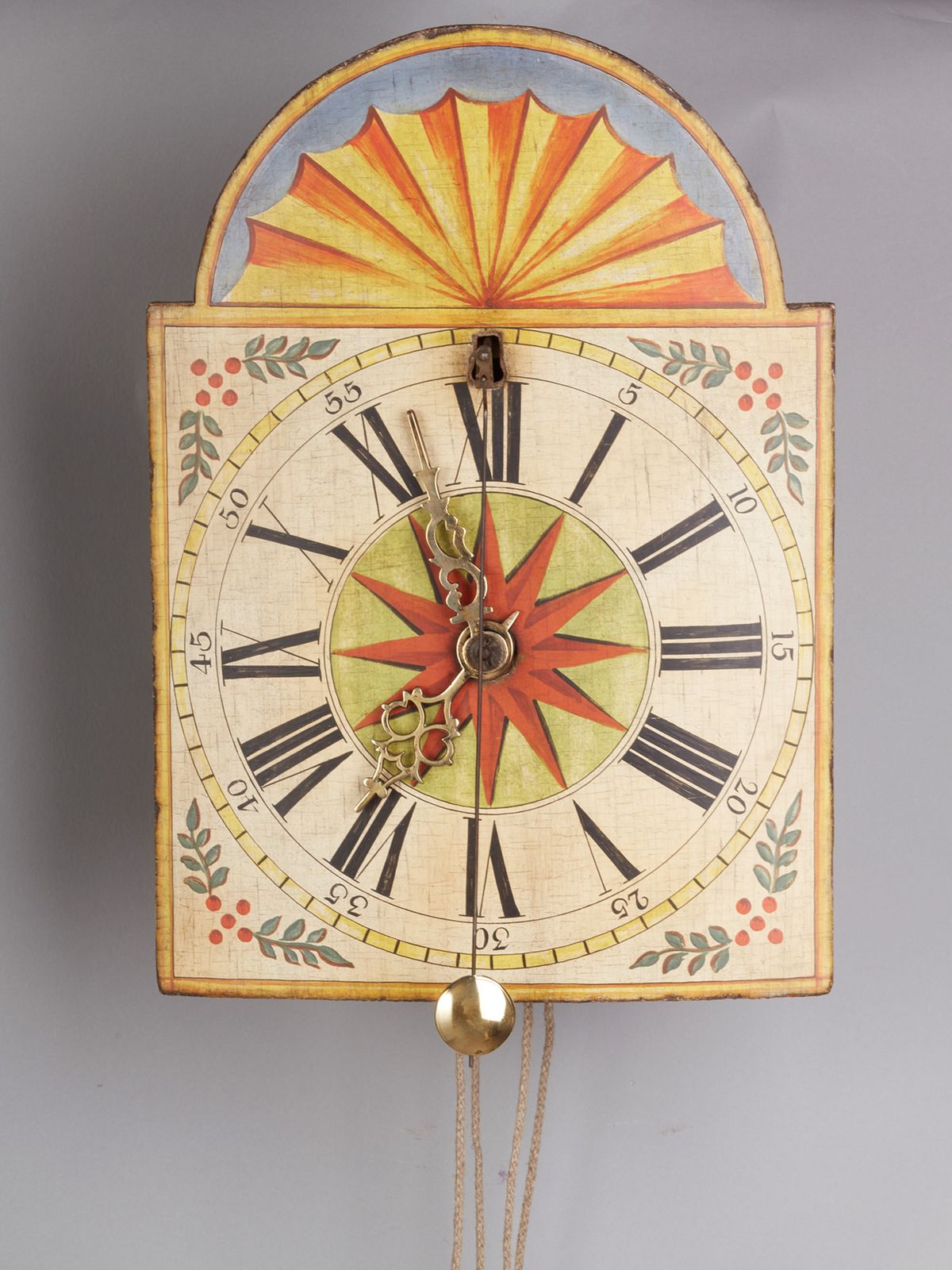 A German Wall Clock with ‘cow’s-tail pendulum’ and wooden wheels circa 1800 - image 1