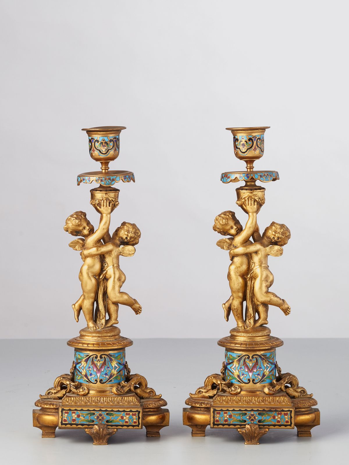 A pair of French ormolu Champleve candlesticks, circa 1880 - image 1