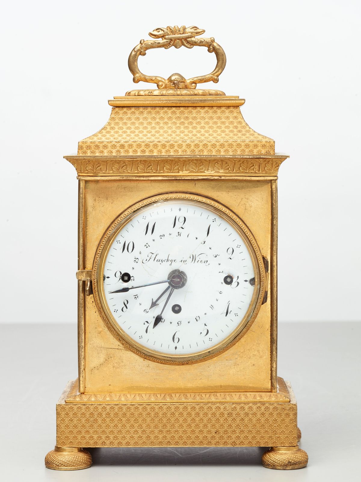 A small Vienna bronze gilt travelling clock by Tobias Flaschge, circa 1810 - image 1
