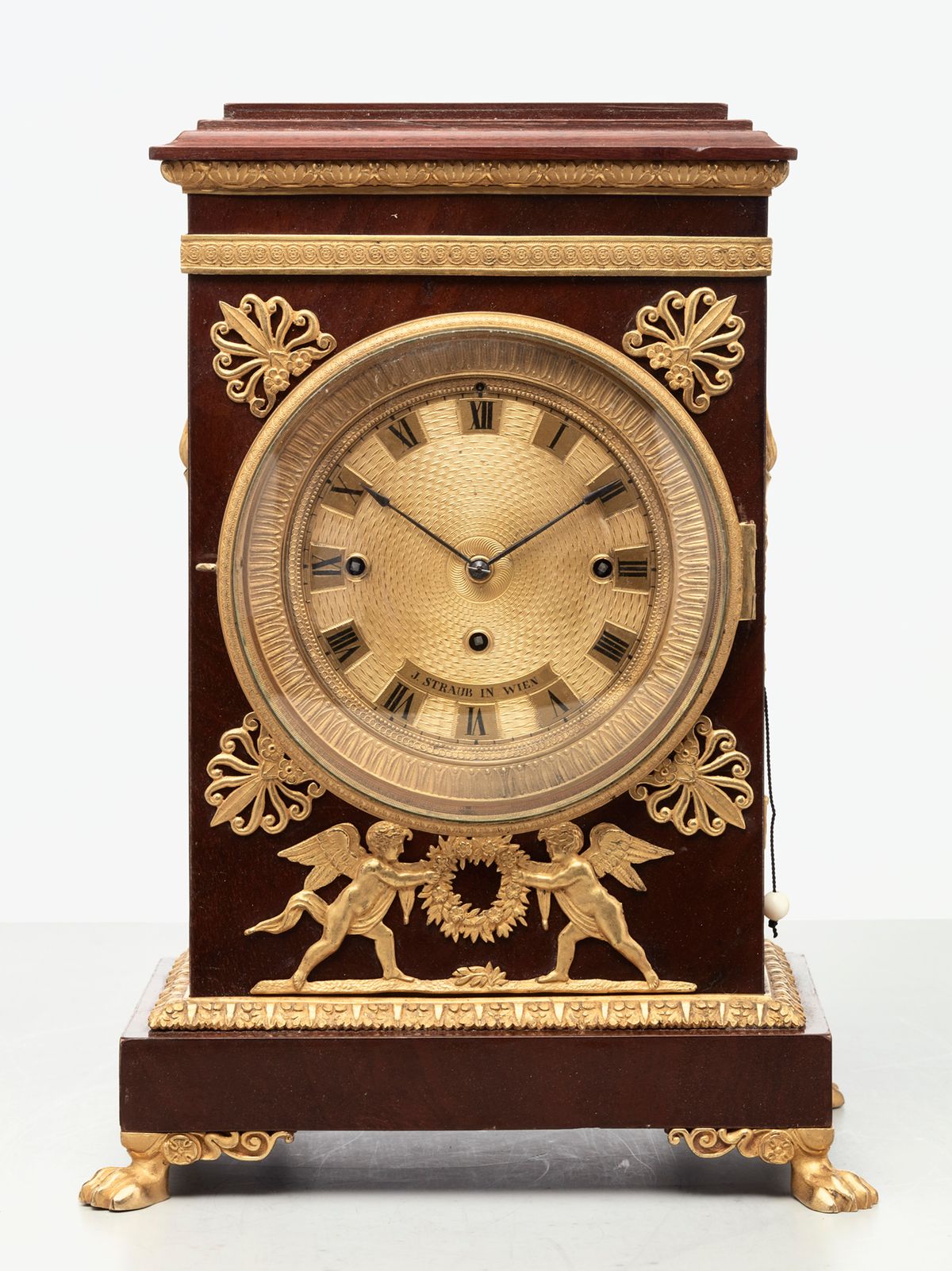 A charming Viennese mahogany and gilt mantel clock by J Straub, circa 1830 - image 1